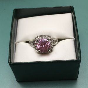 Pink and clear stone ring.